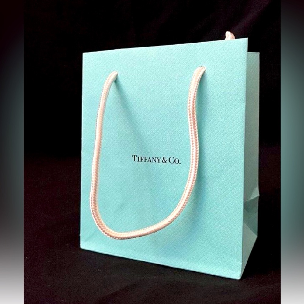 Tiffany empty bag and a small duster